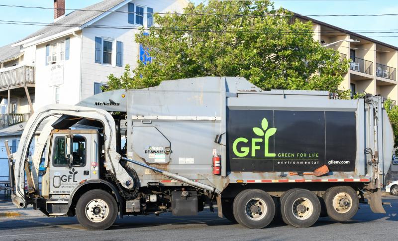 Trash truck on Wilmington Avenue in Rehoboth Beach prior to the Father’s Day 5K. DAVE FREDERICK PHOTO